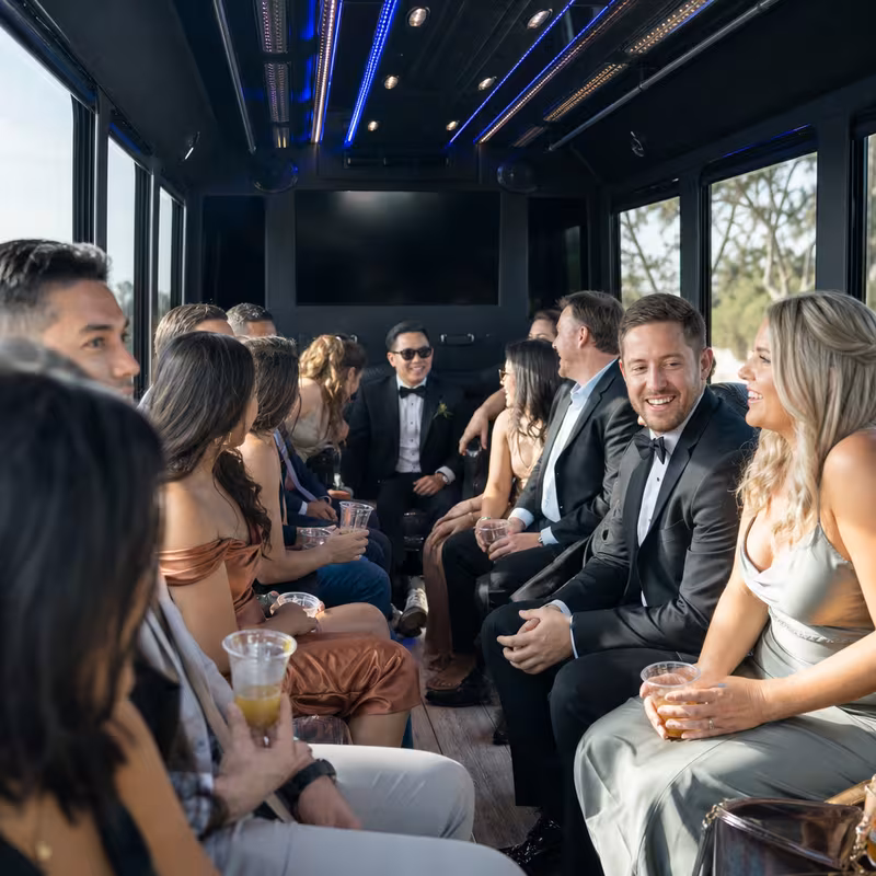 Wedding guests seated inside a Santa Rosa party bus