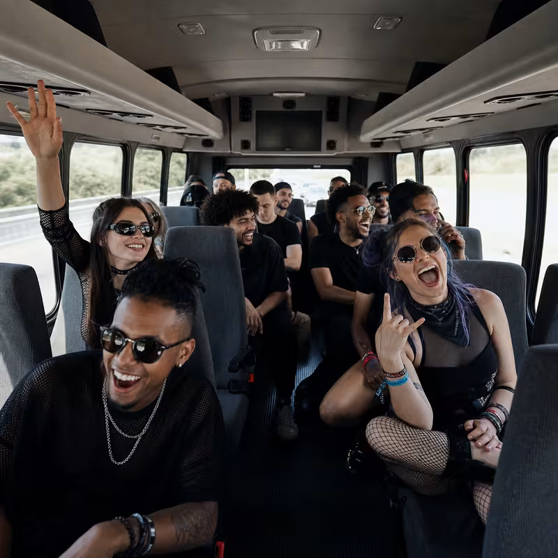 Party bus interior with wraparound leather seating and LED lighting in Santa Rosa