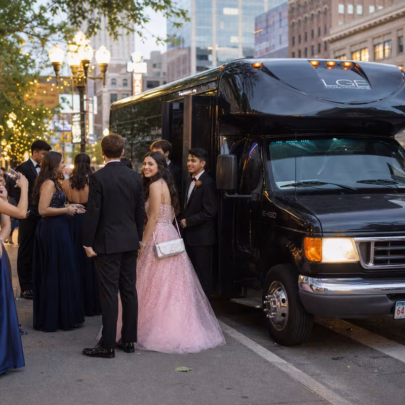 Passengers loading luggage while boarding an Santa Rosa group shuttle