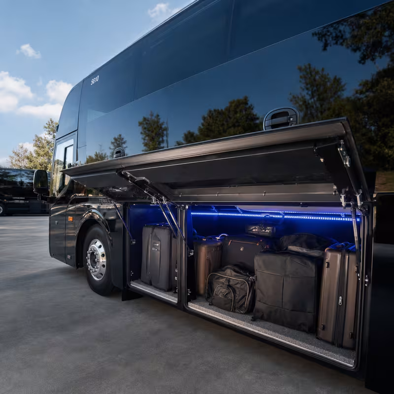 Party bus interior with wraparound leather seating and LED lighting in Santa Rosa