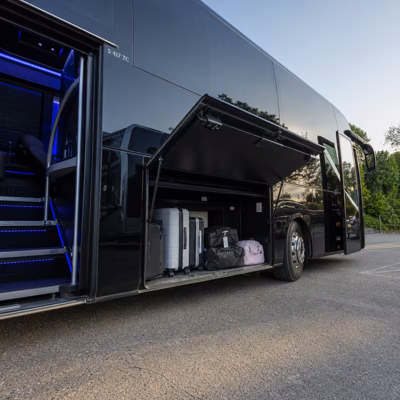 Party bus interior with wraparound leather seating and LED lighting in Santa Rosa